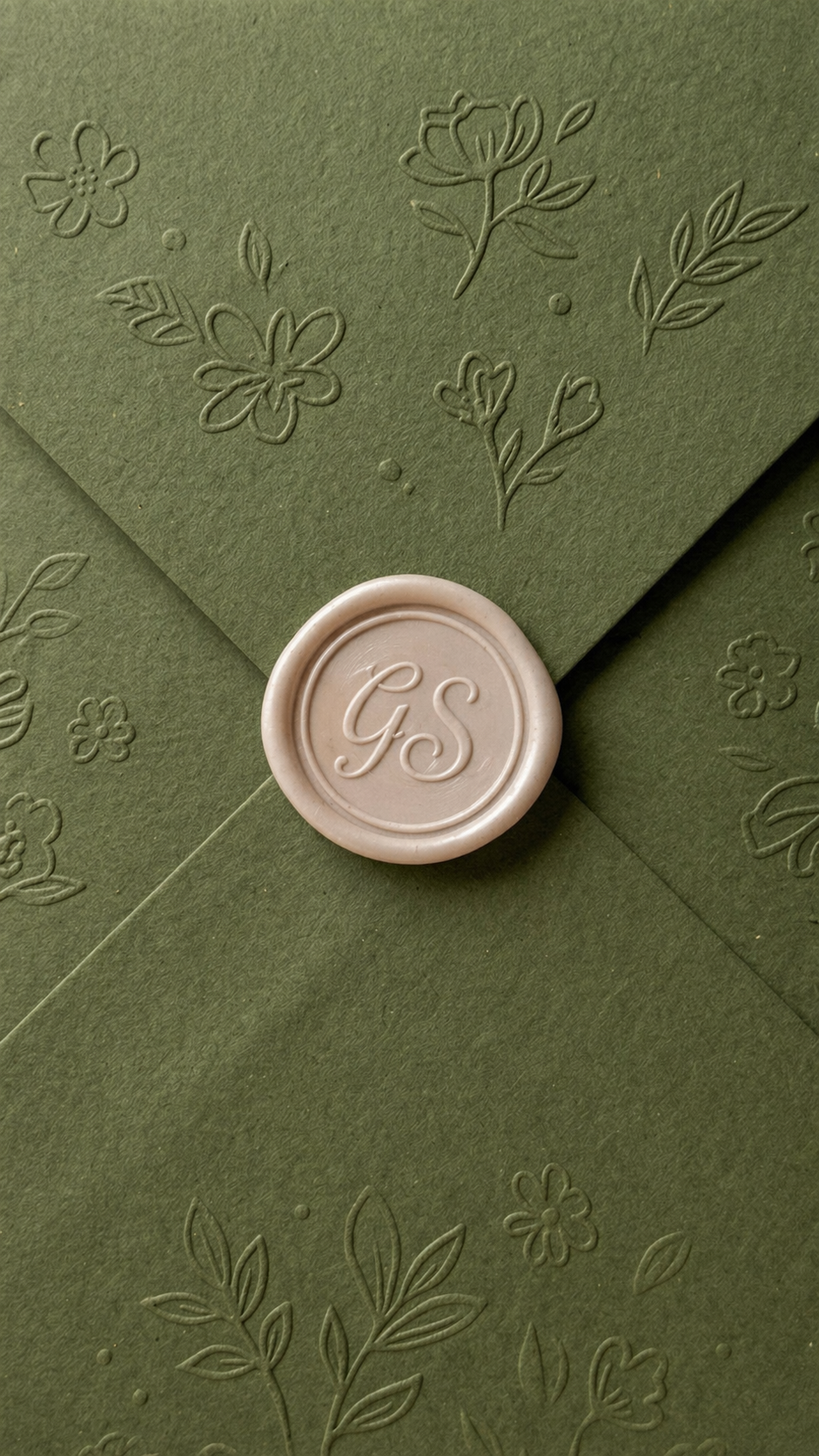 Wedding invitation envelope with floral embossing and wax seal